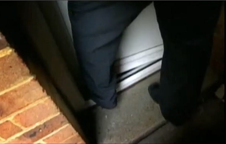 Bailiff jamming boot in door